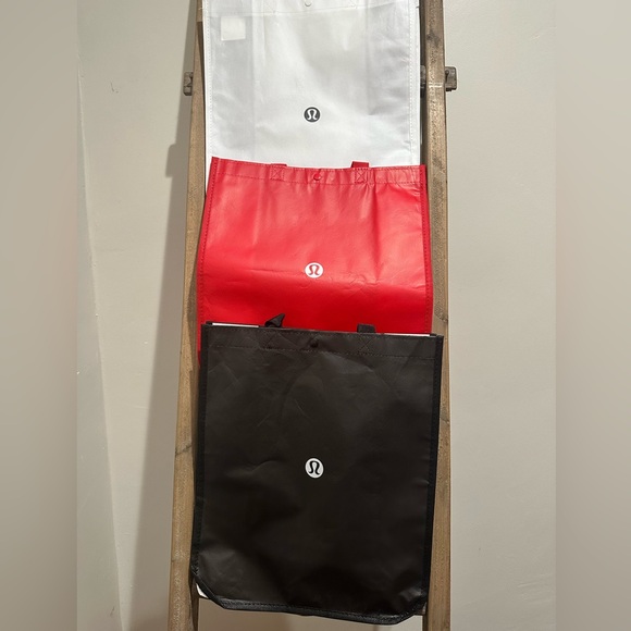 lululemon athletica Handbags - LULULEMON REUSEABLE TOTE BAG IN SIZE LARGE. GREAT FOR GIFTS FOR BUNDLES ONLY